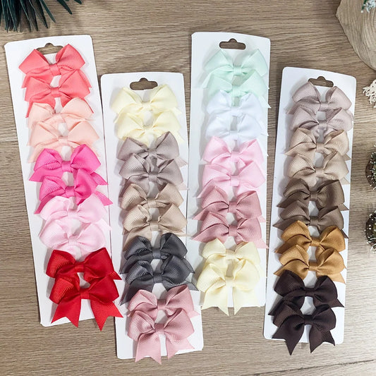 10 pz/set Colore Solido Per Bambini Archi Fermagli Per Capelli per Le Neonate Fatti A Mano Nastro Bowknot Tornante Barrettes Accessori Per Capelli di Capodanno