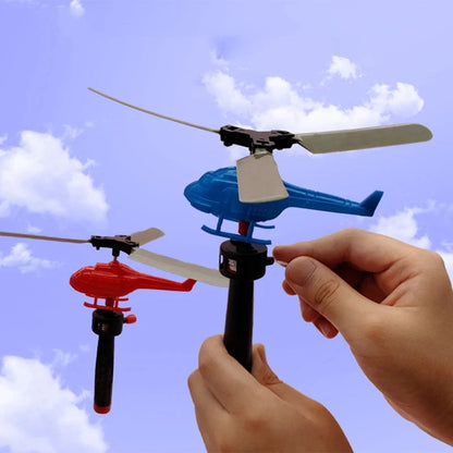 Divertenti giocattoli volanti con coulisse piccolo aereo gioco all'aperto linea di trazione elicottero mosca disegnare corda decollo giocattolo interattivo regalo per bambini