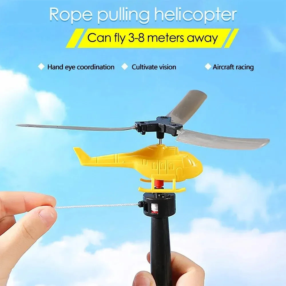 Divertenti giocattoli volanti con coulisse piccolo aereo gioco all'aperto linea di trazione elicottero mosca disegnare corda decollo giocattolo interattivo regalo per bambini